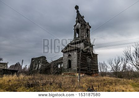 An old abandoned decayed wooden Church of the Intercession of the Holy Virgin in the village Aldia, Tambov region, Russia