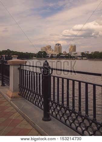 Embankment of the river Iset. Yekaterinburg city. Summer. Day. Cloudy. City landscape. Sverdlovsk region. Russia.