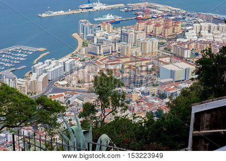 Gibraltar is a British Overseas Territory located on the southern end of the Iberian Peninsula. It  shares its northern border with Spain. The Rock of Gibraltar is the major landmark of the region.