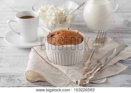 Homemade Sponge Cake With Dried Cranberries And Cup Of Coffee.selective Focus On The Sponge Cake