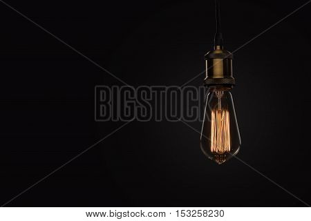 Classic Edison Light Bulb On Black Background