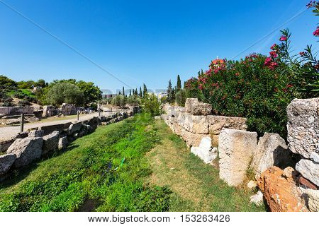 Ruins and part of old wall in ancient Kerameikos district in Athens, Greece