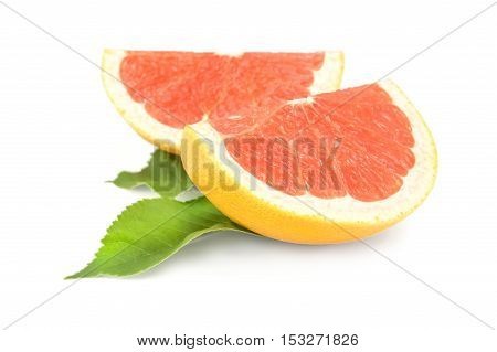 two slices of grapefruit isolated on white background.