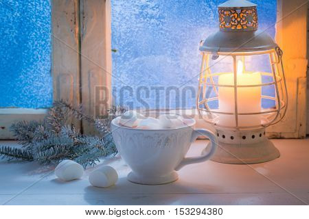 Enjoy your sweet and hot chocolate with marshmallows in cold evening