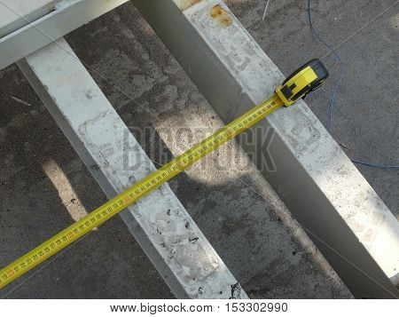 measurement of the dimensions of metal structures on the roof.
