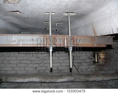 mount metal construction to the plate of the building.