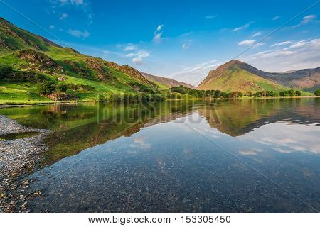 Beautiful Sunset At Lake In District Lake, England