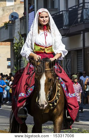 SELARGIUS, ITALY - September 11, 2016: Former marriage Selargino - Sardinia - portrait of a beautiful girl in traditional Sardinian costume