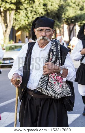 QUARTU S.E., ITALY - September 17, 2016: Parade of Sardinian costumes and floats for the grape festival in honor of the celebration of St. Helena. - Sardinia