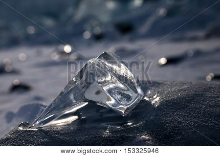 Piece of natural ice in silver colors