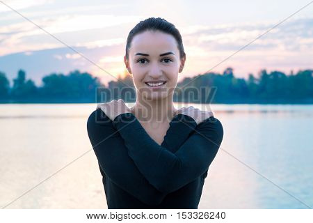 Young Woman Portrait In Morning During Colorful Sunrise