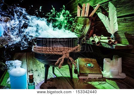 Mysterious Witch Pot With Books And Potions For Halloween