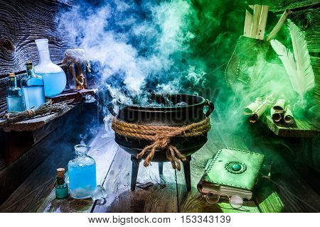 Old Witcher Cauldron With Scrolls, Books And Potions For Halloween