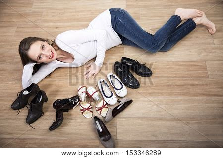 young Woman trying on shoes and scream