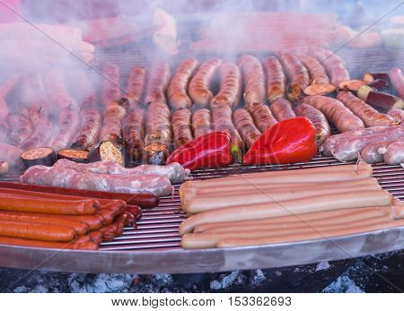 Street food fried on the big grill on Dnepr river embankment during Dnepr city Day local activity