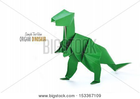 Isolated origami paper green dinosaur on white background