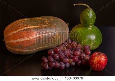 fruits on a dark background, studio picture