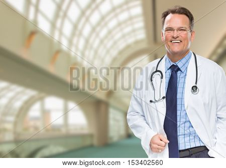 Handsome Male Doctor or Nurse Standing Inside Hospital Building.