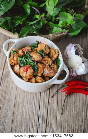 Kapro Kai, Stir Fried Basil Cicken on wooden Thai Famous Food Thai Street Food Thai Cuisine Thai Spicy Food