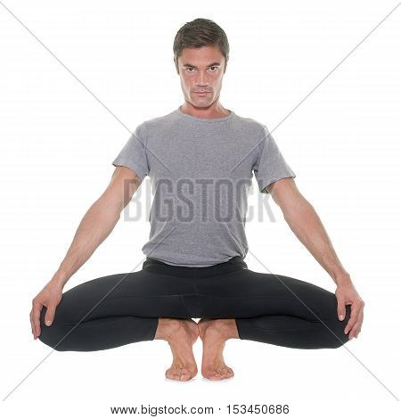 yoga man in front of white background