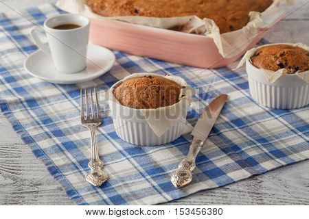 Homemade Sponge Cake With Dried Cranberries And Cup Of Coffee.selective Focus On The Sponge Cake