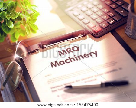 Clipboard with Concept - MRO Machinery with Office Supplies Around. 3d Rendering. Blurred Illustration.