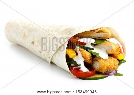 Crumbed Fried Chicken And Salad Tortilla Wrap With White Sauce Isolated On White.
