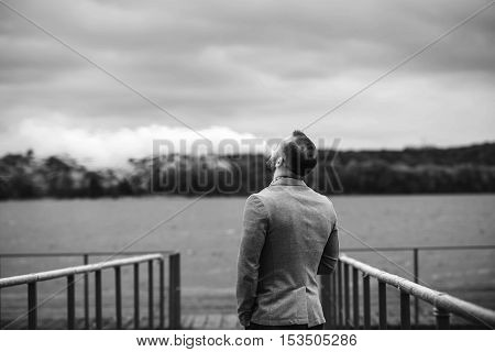 Men With Beard Smoking Electronic Cigarette Outdoor