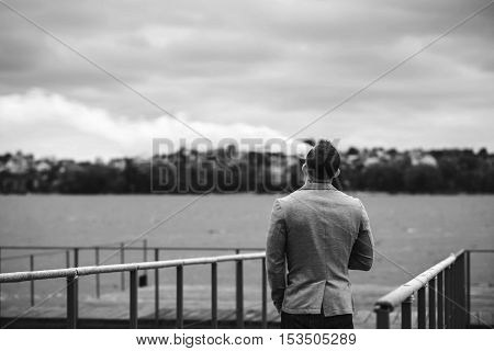 Men With Beard Smoking Electronic Cigarette Outdoor