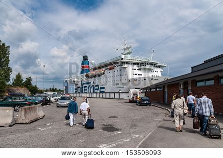 Nynashamn Sweden - July 28 2010: Passengers are boarding a ferry going from Nynashamn to Gdansk Poland. Near Stockholm Sweden at July 28 2010.