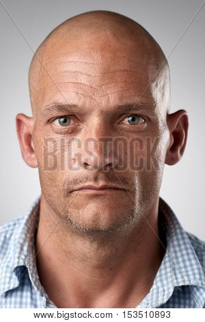 Portrait of real white caucasian man with no expression ID or passport photo full collection of diverse face and expressions