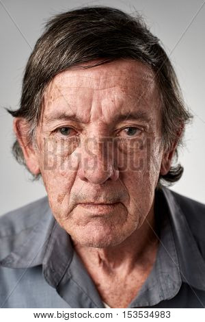 Portrait of real old white caucasian man with no expression ID or passport photo full collection of diverse face and expressions