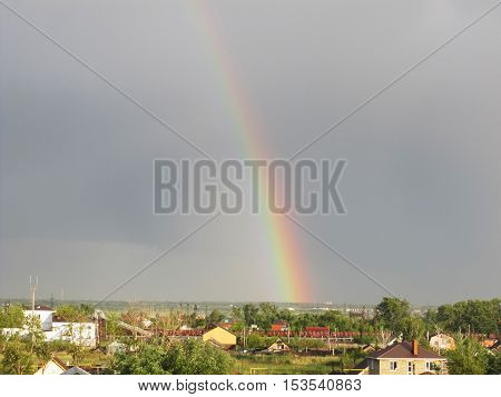 Rainbow in the sky over the city