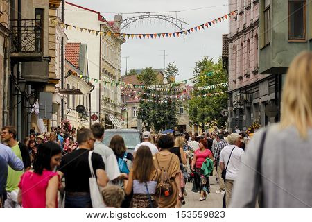Streets in Latvia full of people in city Cesis festival.
