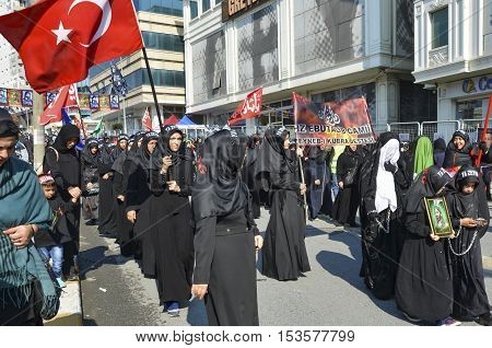 Istanbul Turkey - October 11 2016: Turkish Shia women takes part in an Ashura parade in Istanbul's district of Kucukcekmece. Turkish Shia Muslims mourning for Imam Hussain. Caferis take part in a mourning procession marking the day of Ashura in Istanbul's