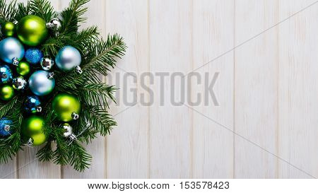 Christmas background with green and blue ornaments. Christmas party decoration. Christmas greeting background. Copy space.