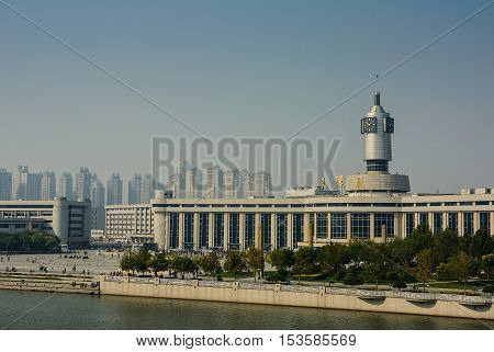 Tianjin,China - October 10 2016 : Cityscape of Tianjin railway station with blue sky background. This station is one of popular modern landmark in Tianjin city.