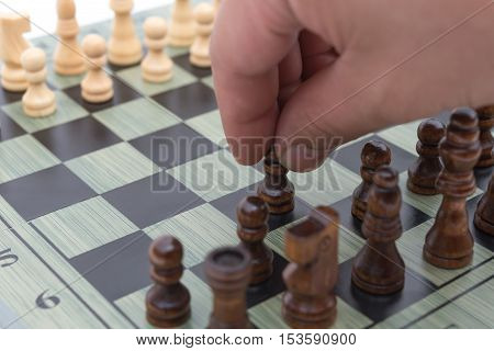 black Pawn of chess moving forward horizontal