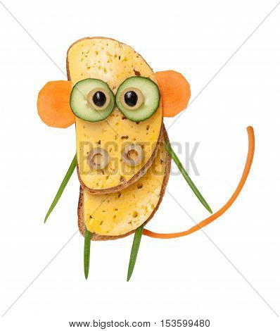 Funny monkey made of bread and vegetables on white background