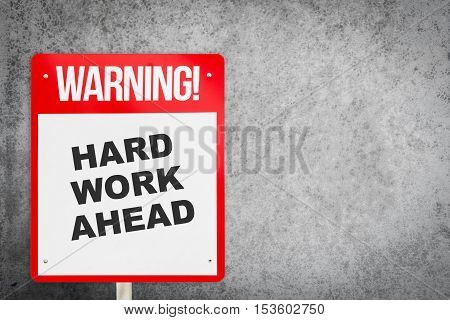 Red Hard work ahead warning sign with copy space. Business concept on Hard work for successful in career. Making a motivative decision on the future by commuting to Hard work.