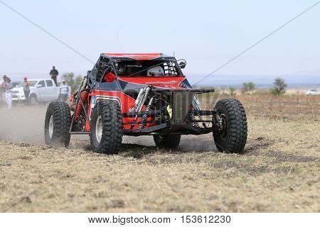 Forty Five Degree Close-up View Of Speeding Red Hellcat Rally Car