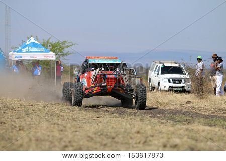 Speeding Red Aceco Rally Car At Start Of Race