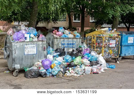 Lviv Ukraine - September 13 2016: Dumpsters being full with garbage