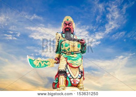 Statue kwnao on sky background Chinese legend of the god's statue