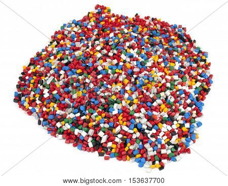 colorful plastic polymer granules on white background
