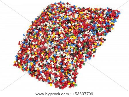 colorful plastic polymer granules on white background