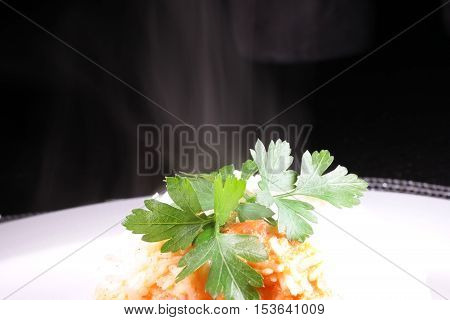 Sausage Stroganoff with rice and leaf parsley