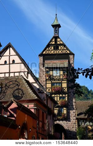 Riquewihr, Elsass, France - OCTOBER 16. The Dolder is a medieval tower in Riquewihr, Alsace and the landmark of the village. The Dolder was built in 1291 as the western end of the fully preserved Riquewihr fortification. on October 16, 2016.