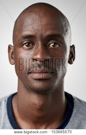 Portrait of real black african man with no expression ID or passport photo full collection of diverse face and expressions