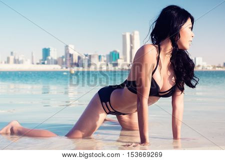 Sexy tourist girl in Dubai city beach